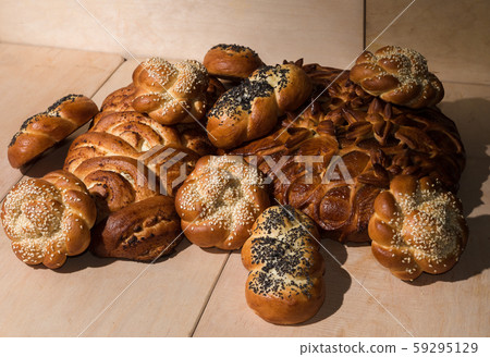 Different bakery products on a wooden background Different bakery products on a wooden background 59295129