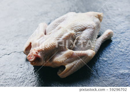Raw chicken on black background - Organic chicken 59296702