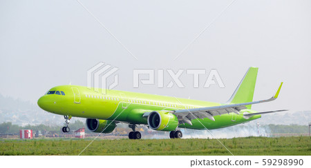 airport airplane landing green runway one modern 59298990