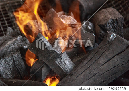 Charcoal and ash burning in the grill Charcoal and ash burning in the grill 59299339