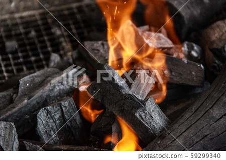 Charcoal and ash burning in the grill Charcoal and ash burning in the grill 59299340