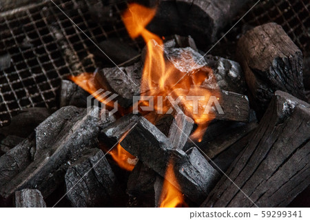 Charcoal and ash burning in the grill Charcoal and ash burning in the grill 59299341