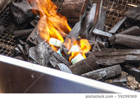Charcoal and ash burning in the grill Charcoal and ash burning in the grill 59299369