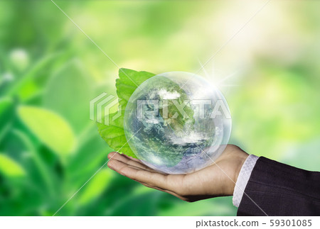 World in Hand and Blurred Beautiful Bokeh in the 59301085