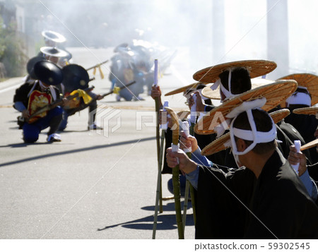 People firing fireguns at the Nagatoro Kego Festival People firing fireguns at the Nagatoro Kego Festival 59302545