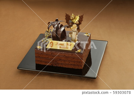 Christmas cake on various backgrounds on a plate 59303078