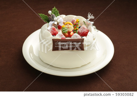 Christmas cake on a plate on various backgrounds 59303082