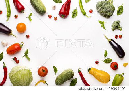 Frame of colored organic vegetables on white 59304401
