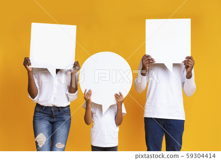 Black family of three covering faces with empty speech bubbles Black family of three covering faces with empty speech bubbles 59304414