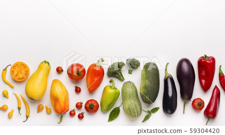 Healthy rainbow of fresh vegetables isolated on white Healthy rainbow of fresh vegetables isolated on white 59304420