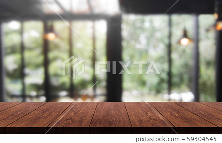 Wood table in blur background of modern restaurant Wood table in blur background of modern restaurant 59304545