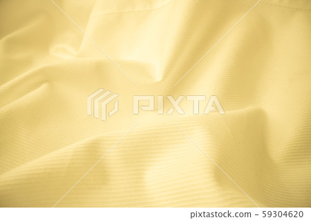 Shiny flowing cloth texture in macro shot. 59304620