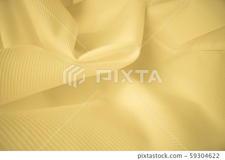 Shiny flowing cloth texture in macro shot. Shiny flowing cloth texture in macro shot. 59304622