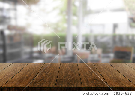 Wood table in blur background of modern restaurant 59304638