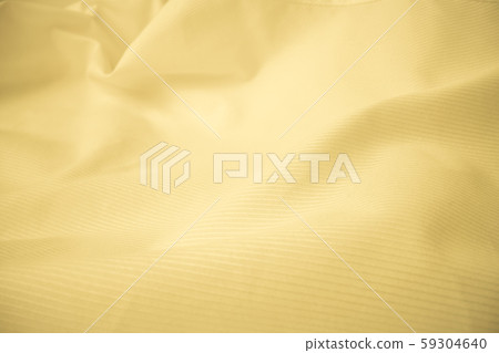 Shiny flowing cloth texture in macro shot. Shiny flowing cloth texture in macro shot. 59304640