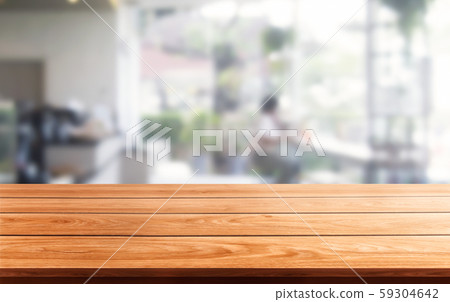Wood table in blur background of modern restaurant Wood table in blur background of modern restaurant 59304642