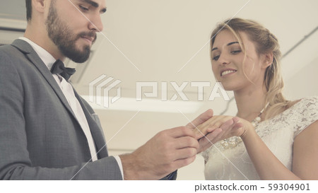 Bride and groom in wedding dress prepare ceremony. Bride and groom in wedding dress prepare ceremony. 59304901