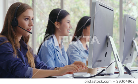 Customer support agent or call center with headset Customer support agent or call center with headset 59304902
