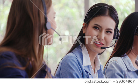 Customer support agent or call center with headset Customer support agent or call center with headset 59304907