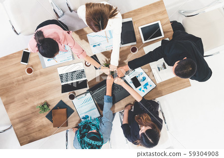 Teamwork business people join hands in meeting. Teamwork business people join hands in meeting. 59304908