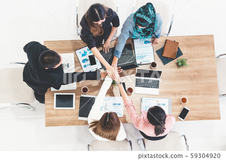 Teamwork business people join hands in meeting. Teamwork business people join hands in meeting. 59304920