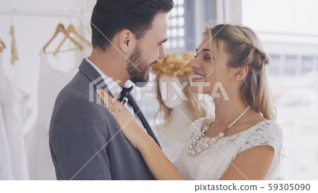 Bride and groom in wedding dress prepare ceremony. Bride and groom in wedding dress prepare ceremony. 59305090