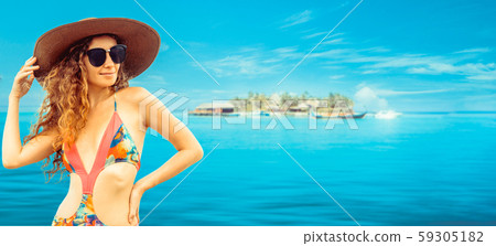 Happy young woman at beach in summer vacation. 59305182