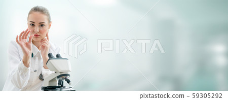 Scientist researcher uses microscope in laboratory 59305292