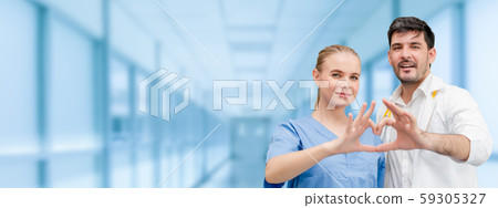 Doctors at hospital working with another doctor. Doctors at hospital working with another doctor. 59305327