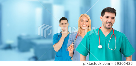 Doctor working in hospital with other doctors. Doctor working in hospital with other doctors. 59305423