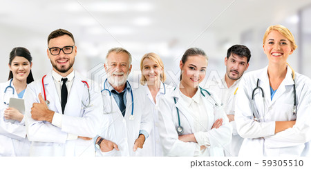 Doctor working in hospital with other doctors. Doctor working in hospital with other doctors. 59305510