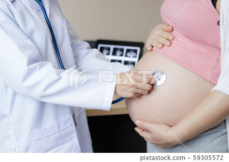 Pregnant Woman and Gynecologist Doctor at Hospital 59305572