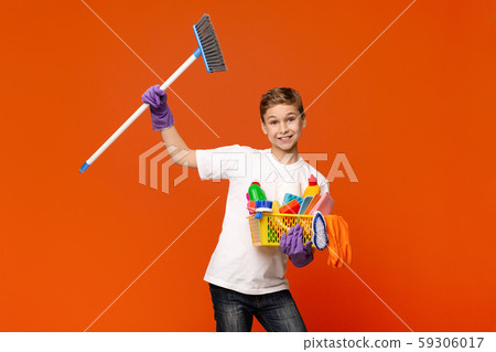 Playful teenager dancing with detergents and mop Playful teenager dancing with detergents and mop 59306017
