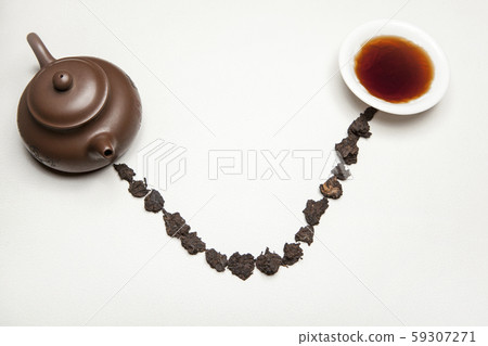 teapot cup white leather background teapot cup white leather background 59307271
