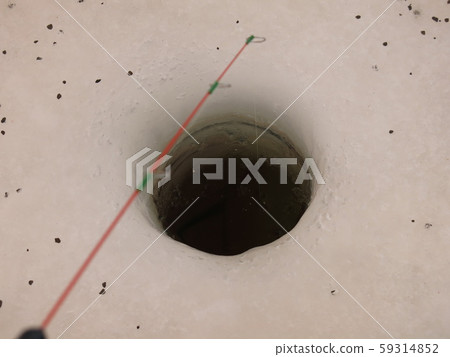 Smelt fishing on ice for smelt (smelt fishing in a hole in a tent) Smelt fishing on ice for smelt (smelt fishing in a hole in a tent) 59314852