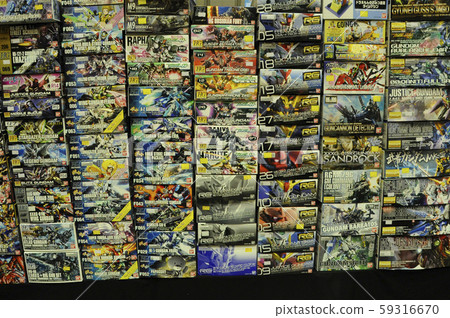Various types of model kit toy boxes are stacked overlapping and sold to fans. 59316670