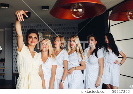 Beautiful happy girls gathering together for 59317263