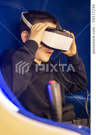 Child watching movie with VR glasses. Special 59317748