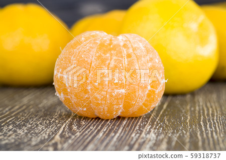 peeled sweet and juicy tangerine peeled sweet and juicy tangerine 59318737