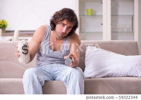 Unemployed man desperate at home Unemployed man desperate at home 59322344