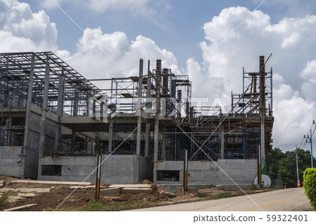 Building and Construction Site in progress. Building construction site against cloudy sky. Metal 59322401