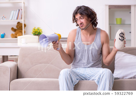 Unemployed man desperate at home 59322769