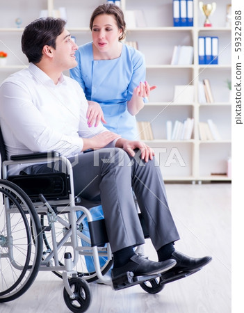 Disabled patient on wheelchair visiting doctor for regular check Disabled patient on wheelchair visiting doctor for regular check 59322988