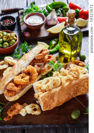 Bocadillos De Calamares on a wooden board 59323672