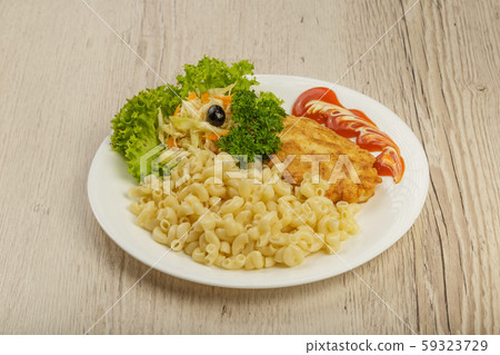 Pasta with a piece of grilled meat and salad. 59323729