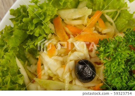 Pasta with a piece of grilled meat and salad. Pasta with a piece of grilled meat and salad. 59323754