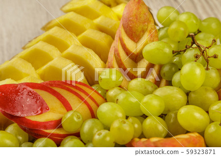 Very nice and artistically sliced fruits on a Very nice and artistically sliced fruits on a 59323871