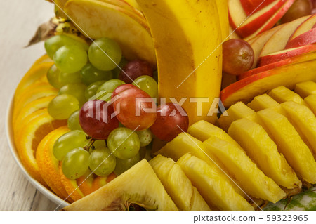 Very nice and artistically sliced fruits on a Very nice and artistically sliced fruits on a 59323965