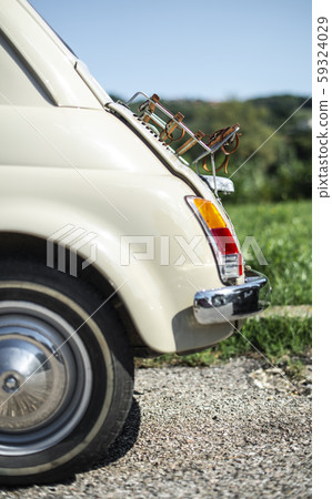 Vintage beige color car. Small old car. Italian 59324029