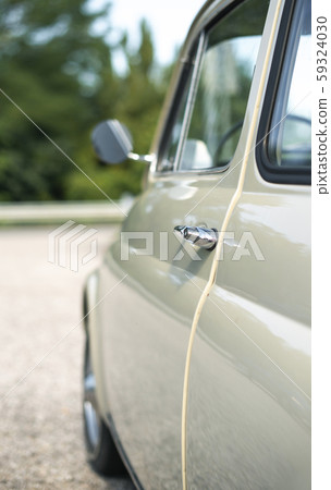 Vintage beige color car. Small old car. Italian 59324030